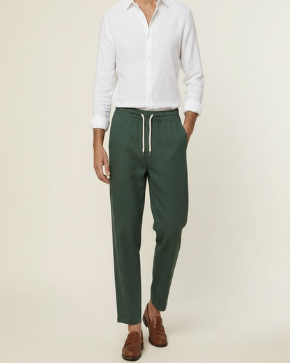 Pael Trousers - Relaxed Linen in Green - midsize front