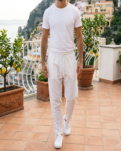 Jaan Trousers - Relaxed Linen in White - outdoor 1