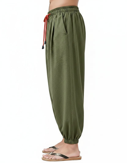 Jaan Trousers - Linen in army green - profile front
