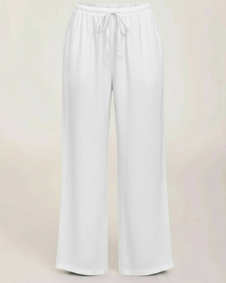 Sloane Trousers - Relaxed Wide-Leg Linen in White - profile front white