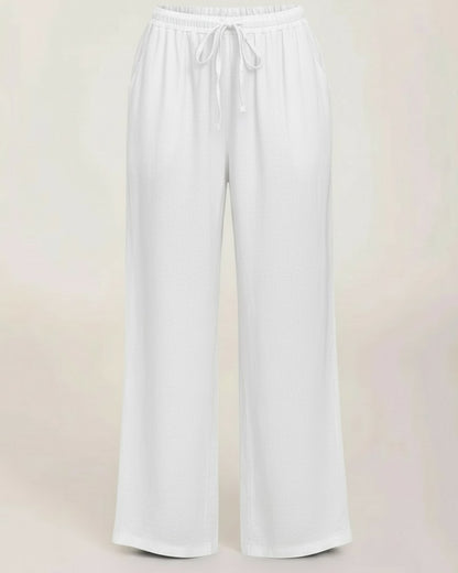 Sloane Trousers - Relaxed Wide-Leg Linen in White - profile front white