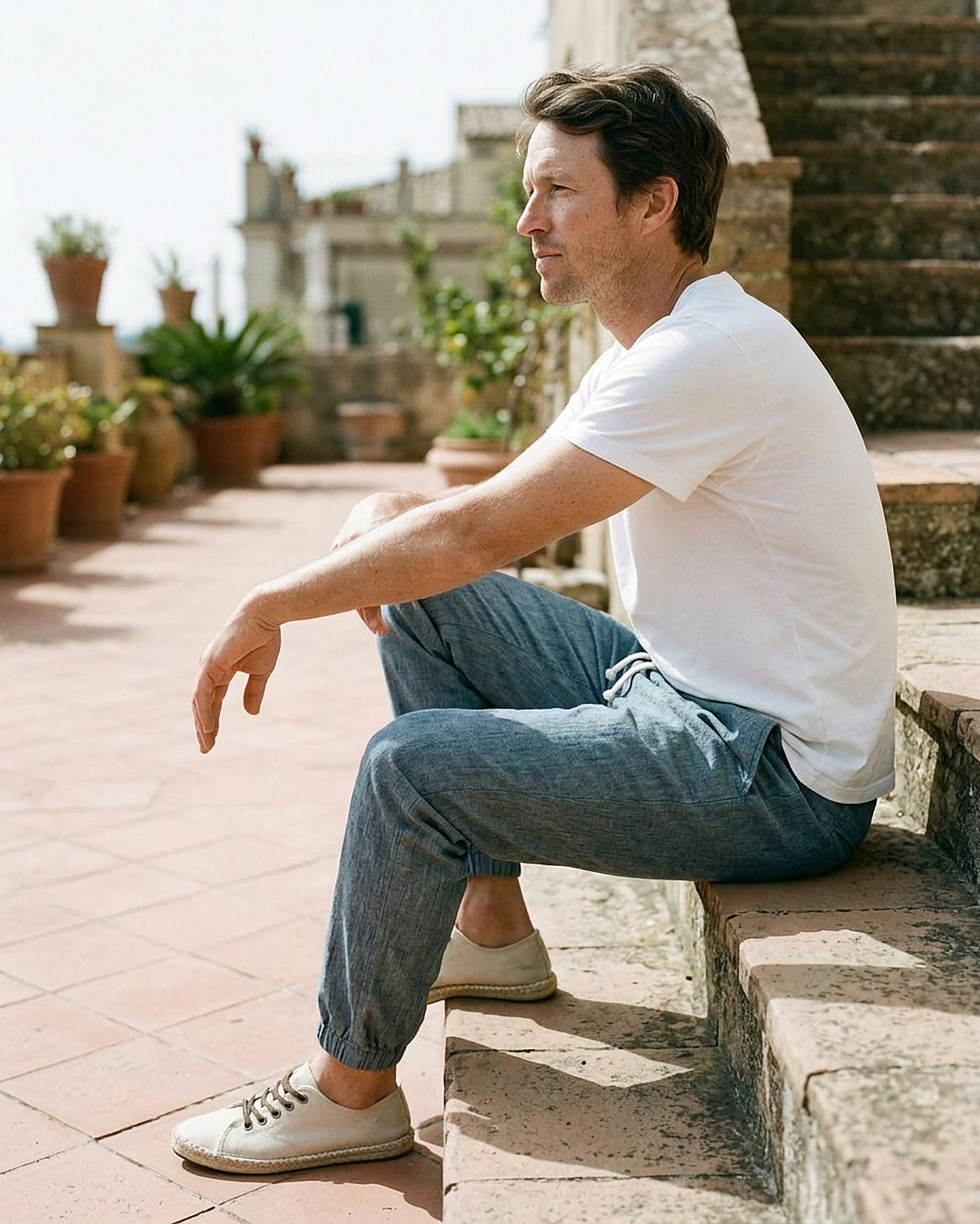 Anchor Trousers - Relaxed Denim in Light blue - seated 1